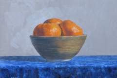 Clementines in Pottery Bowl on Blue Velvet